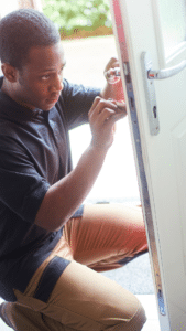 Locksmith Repairing Door - Logan Square Locksmith